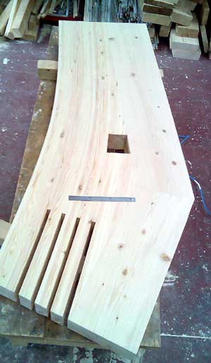 Glulam repair piece with slots for connection bars and resin