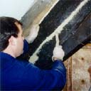 Sherbourne School Rafters - filling splits and cracks